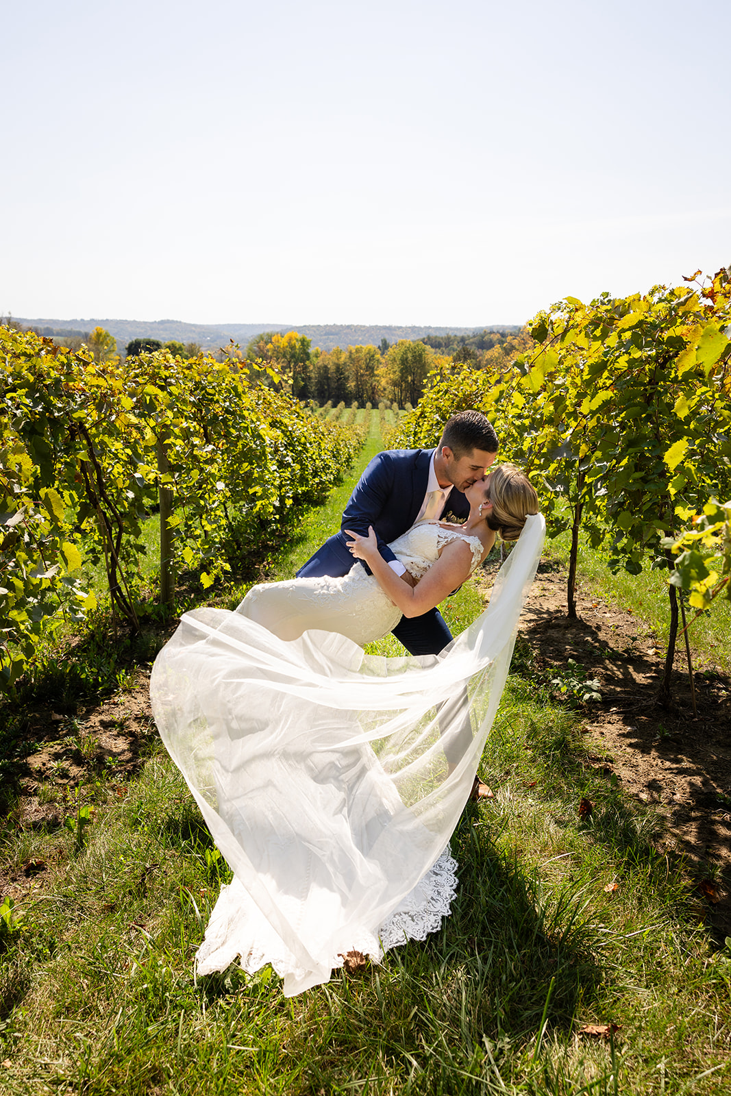 Dip kiss in the vineyard at canon river winery