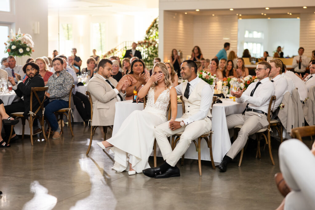 bride and groom crying during speeches at the hutton house